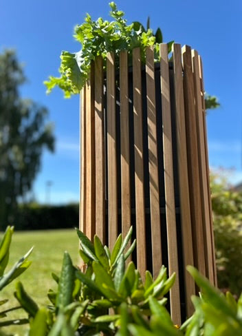 Samløs. Afskærmende plantekasser i teak